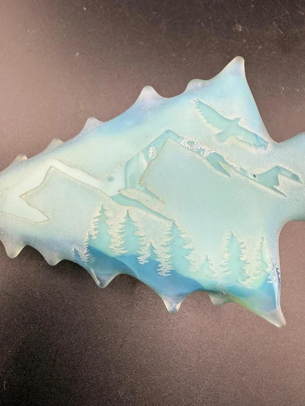 Brando Glass Belt Buckle – Light Blue Sandblasted Arrowhead w/ Mountain & Forest Scene