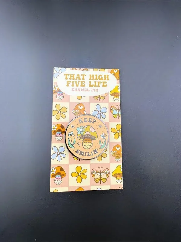 That High Five Life Enamel Pin – Keep Smilin’ Hard